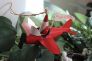 Santa in a Red Planeclass=